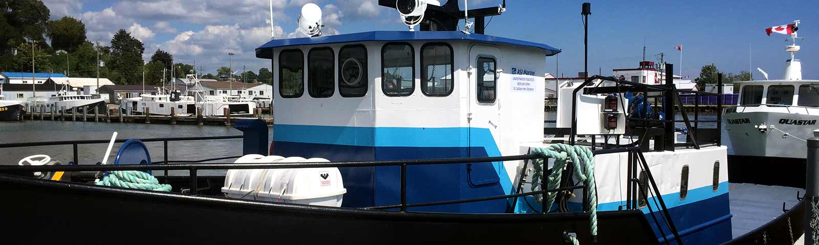 Cleaning, painting and refinishing tugs, boats, ships, barges and platforms.